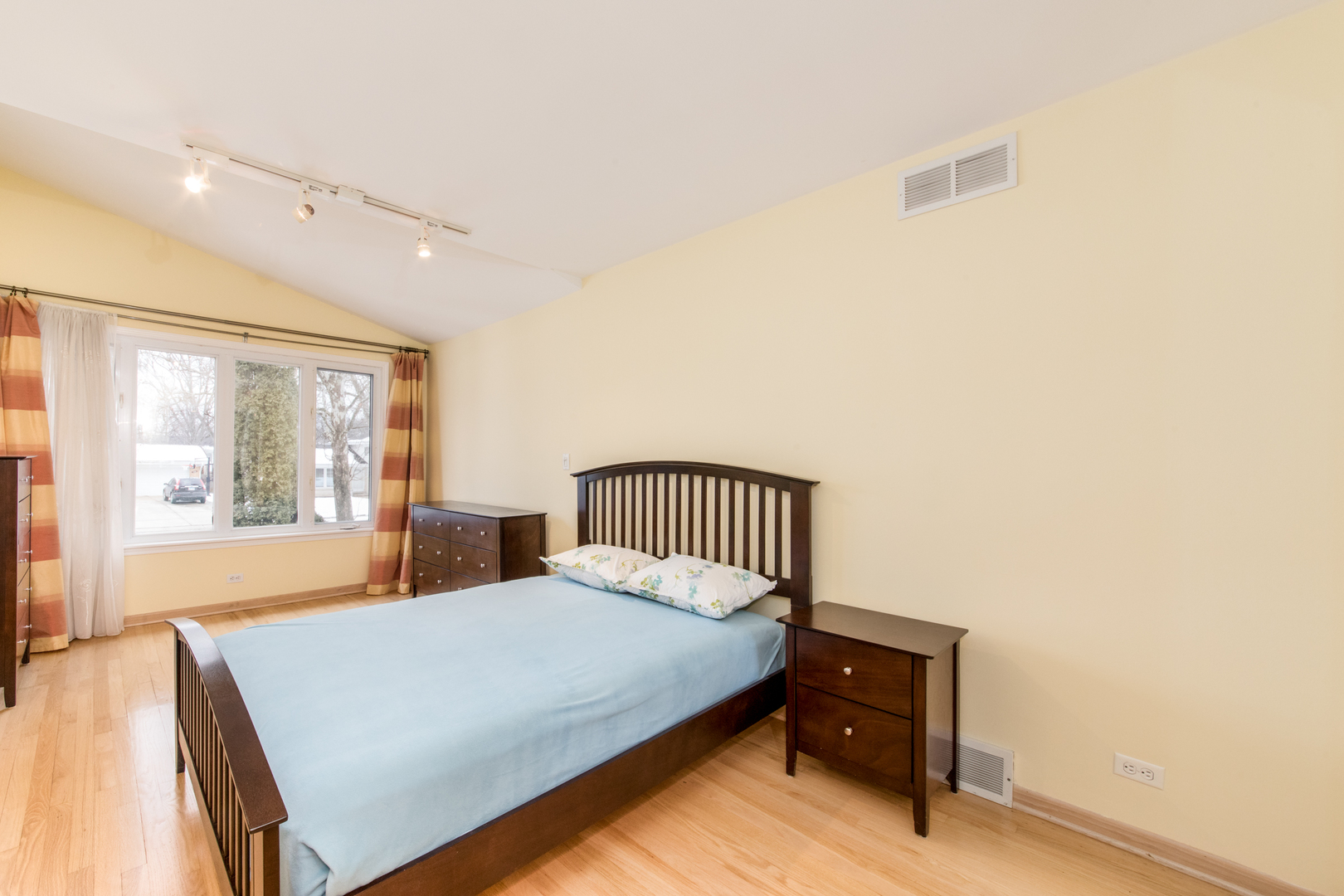 2010 Walnut Street Park Ridge, IL 60068 - Photo 11 of 20 a bedroom with a bed and wooden floor