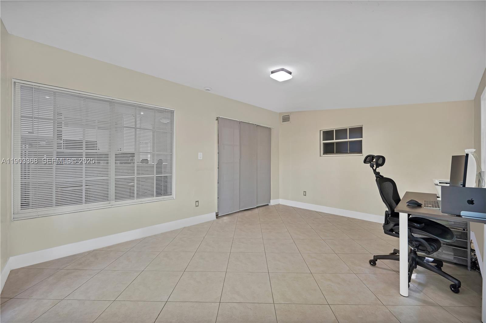 818 Northeast 3rd Street Hallandale Beach, FL 33009 - Photo 20 of 24 a view of workspace with windows