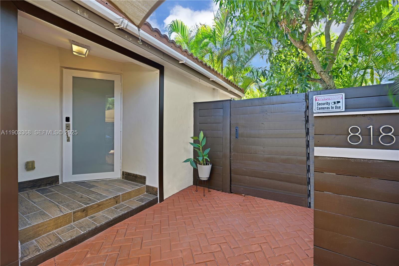 818 Northeast 3rd Street Hallandale Beach, FL 33009 - Photo 24 of 24 a view of a door of the house