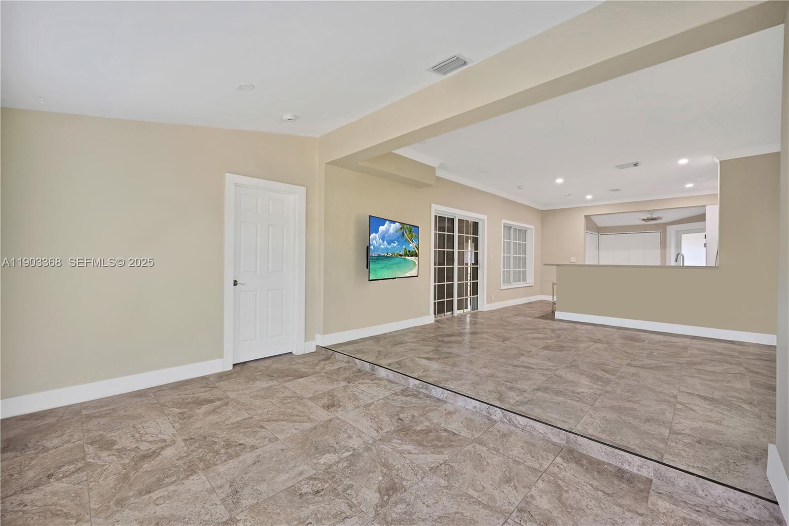 818 Northeast 3rd Street Hallandale Beach, FL 33009 - Photo 4 of 24 a view of an empty room
