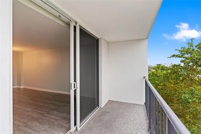 a view of hallway with a sink