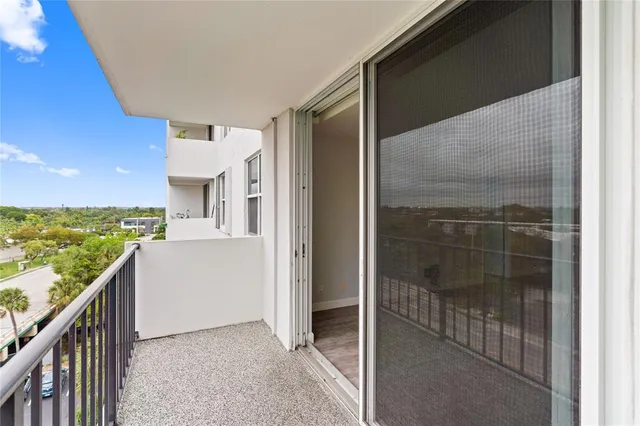 a view of a balcony with an outdoor space