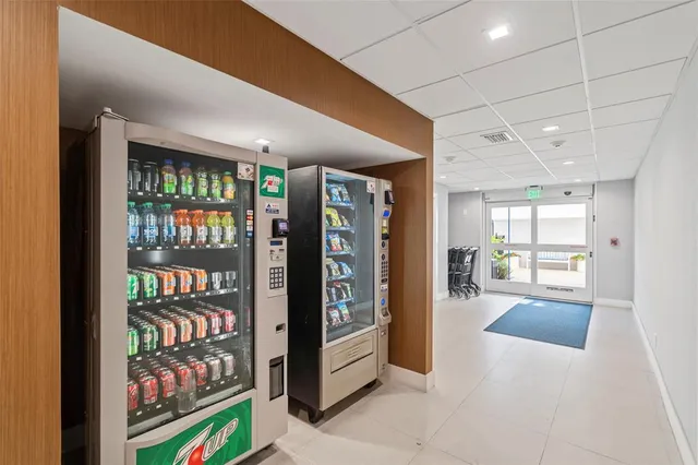 a view of a hallway with a bookshelf