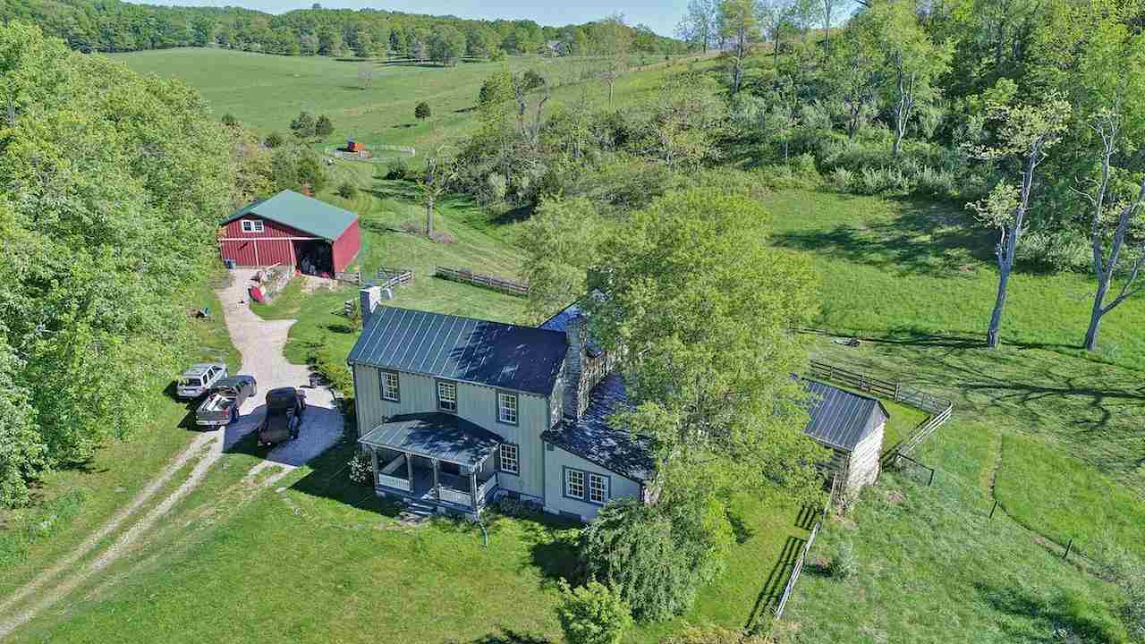 1108 Newport Road Raphine, VA 24472 - Photo 11 of 50 a backyard of a house with a yard and outdoor seating