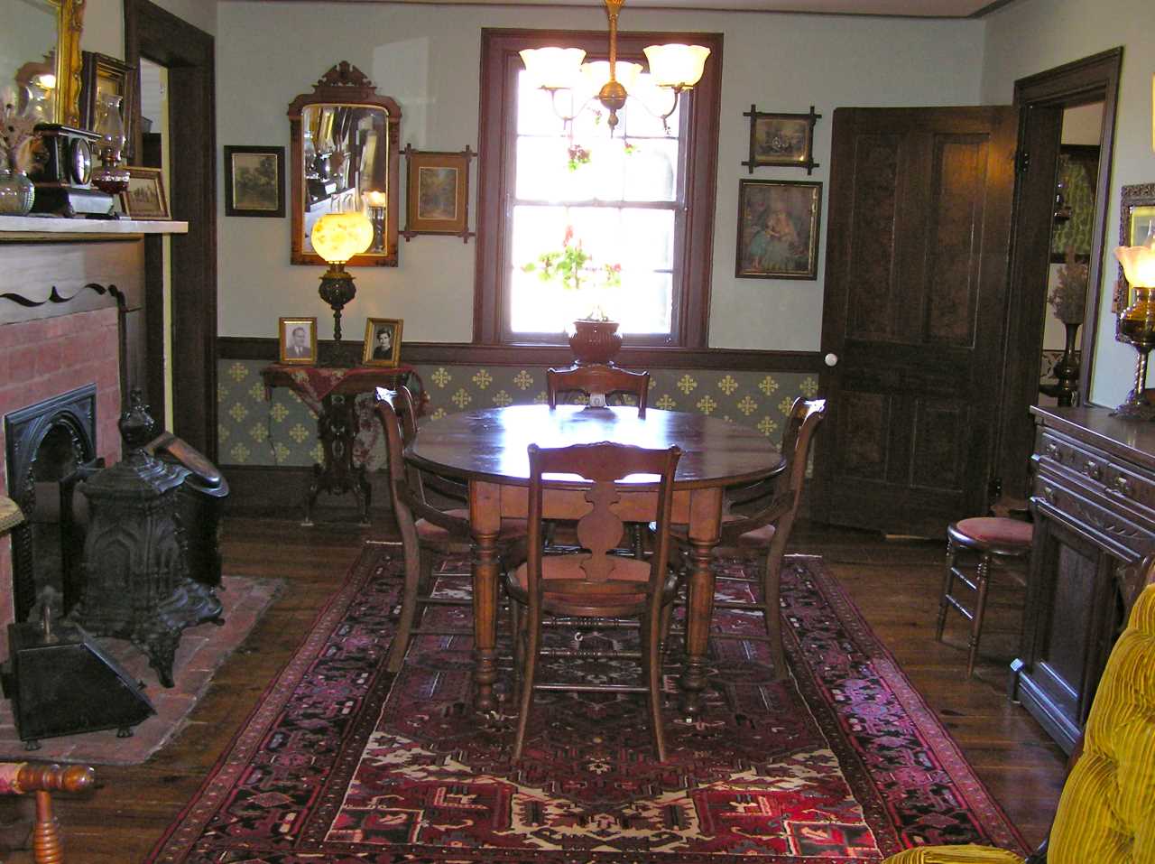 1108 Newport Road Raphine, VA 24472 - Photo 18 of 50 a view of a dining room with furniture and a window