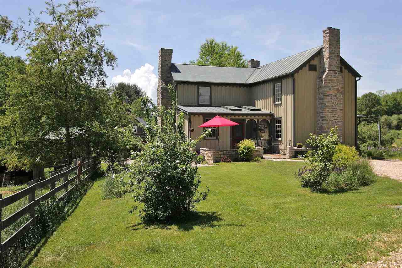 1108 Newport Road Raphine, VA 24472 - Photo 2 of 50 a front view of a house with a yard