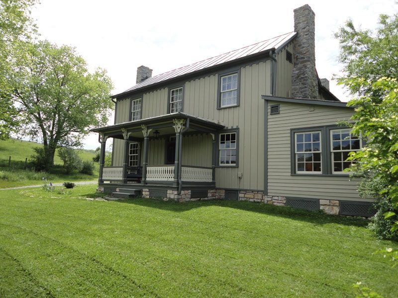 1108 Newport Road Raphine, VA 24472 - Photo 3 of 50 front view of a house with a yard