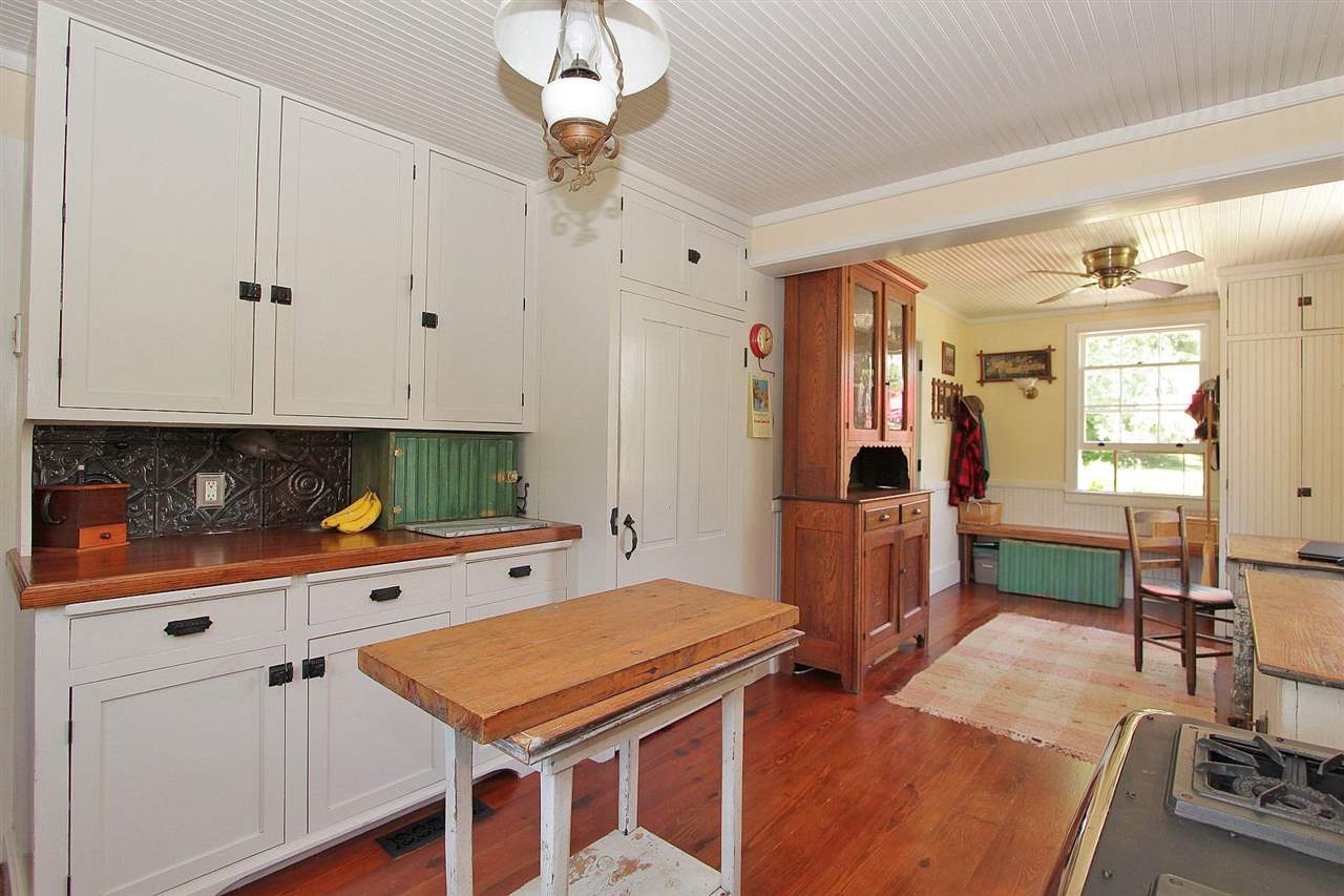 1108 Newport Road Raphine, VA 24472 - Photo 35 of 50 a kitchen with stainless steel appliances a stove refrigerator and cabinets