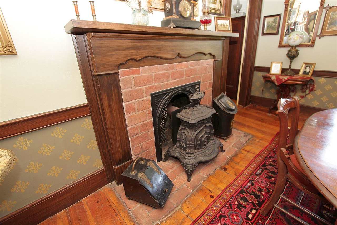 1108 Newport Road Raphine, VA 24472 - Photo 42 of 50 a close view of shoes a fireplace and wooden floor