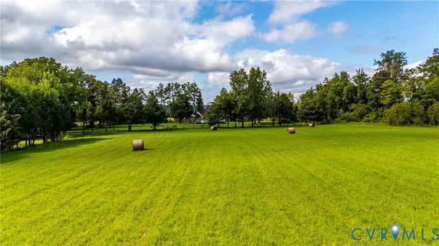 a view of a golf course with a lake