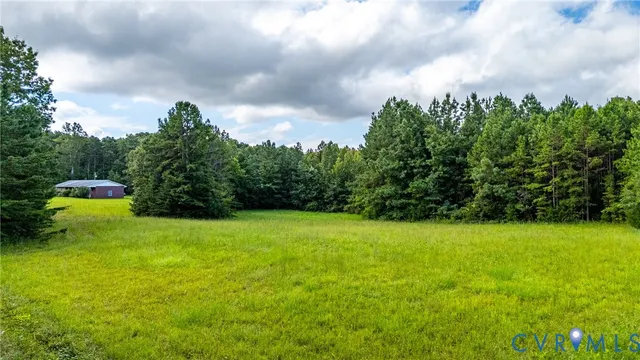 a fire hydrant in the middle of a field