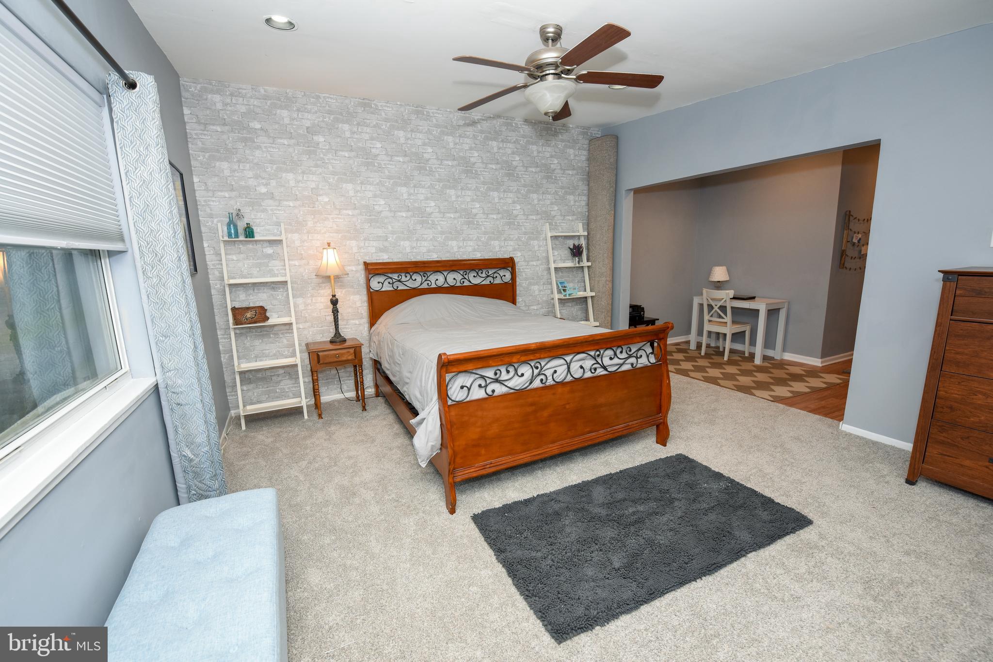 9332 Rising Sun Avenue Philadelphia, PA 19115 - Photo 14 of 27 a bed room with a bed and a window