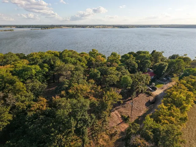 a view of a lake with a garden