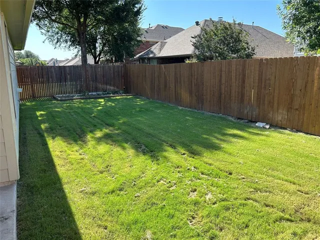 a view of a room with porch and a yard