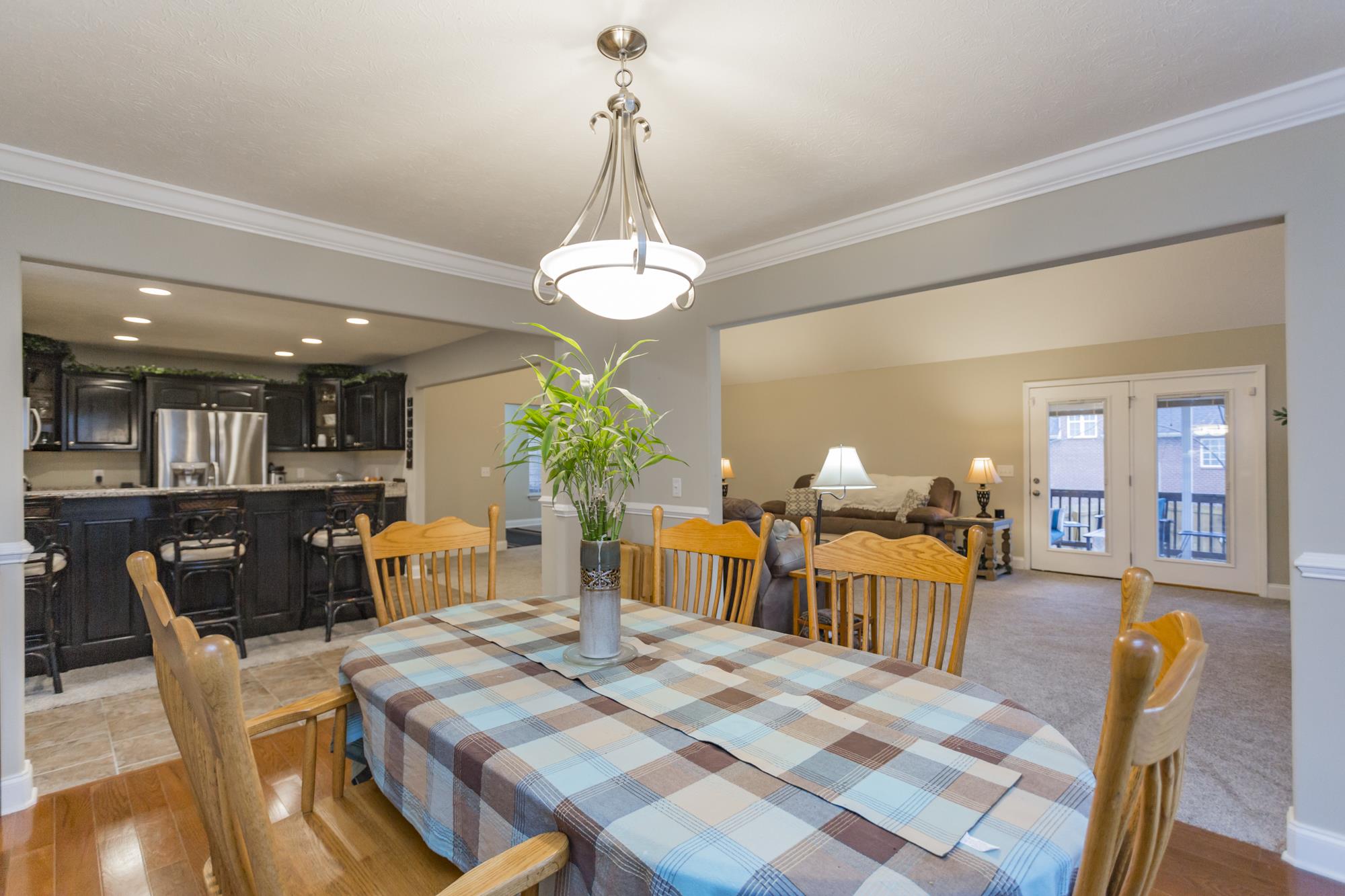484 Fowler Ford Road Portland, TN 37148 - Photo 11 of 29 a view of a dining room with furniture and chandelier