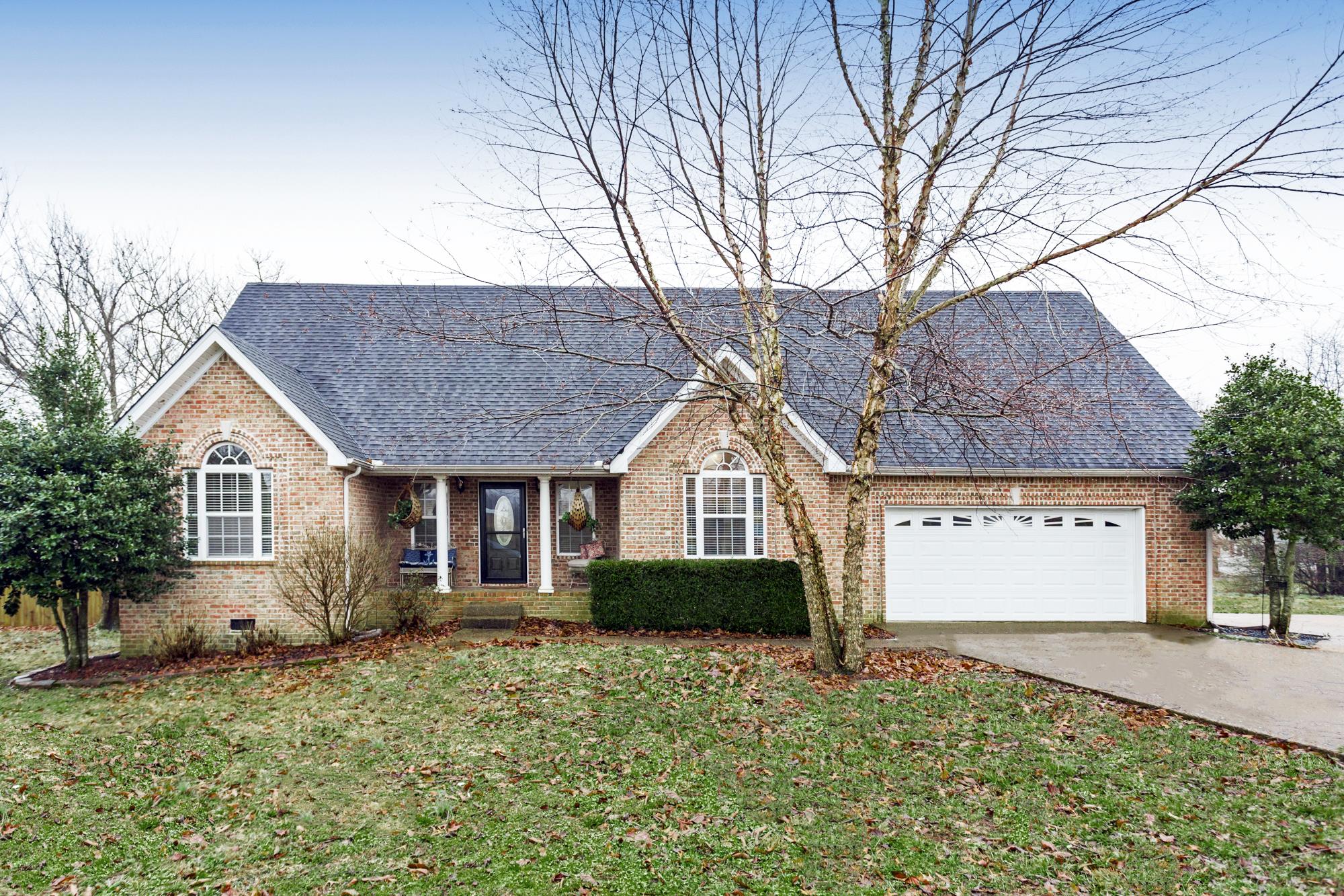 484 Fowler Ford Road Portland, TN 37148 - Photo 2 of 29 a front view of a house with garden