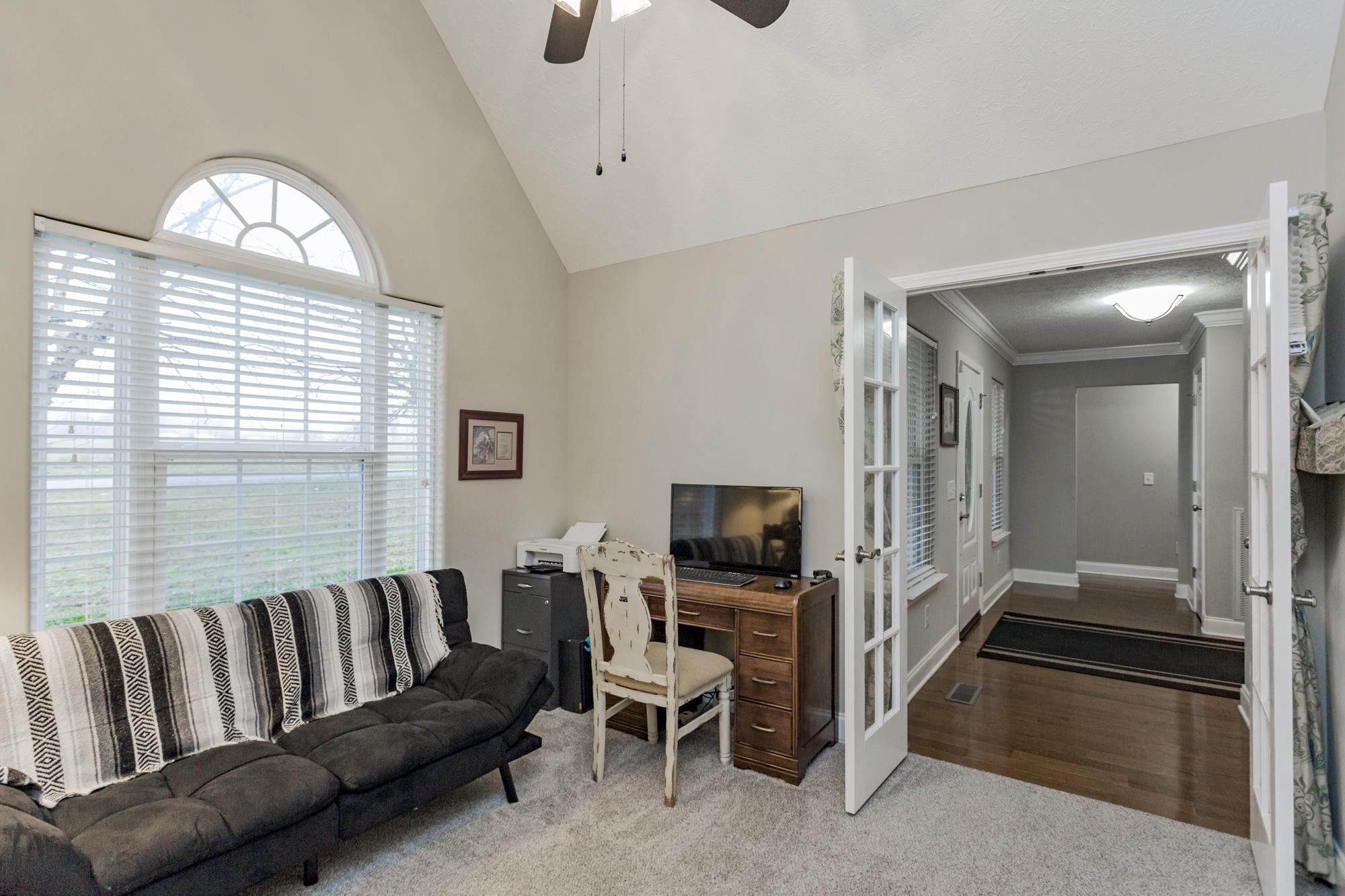 484 Fowler Ford Road Portland, TN 37148 - Photo 6 of 29 a living room with furniture and a flat screen tv