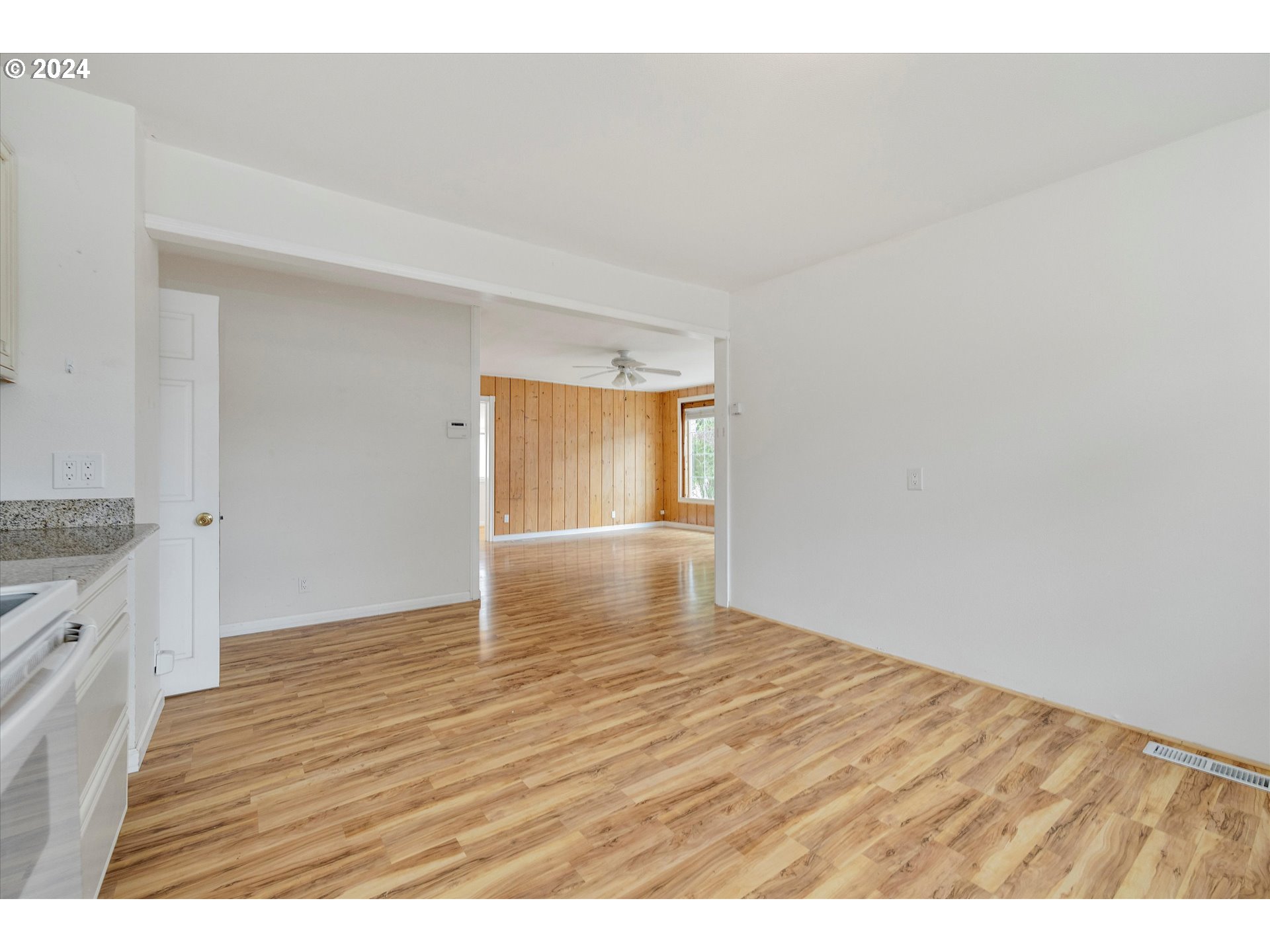 16265 Highway 224 Damascus, OR 97089 - Photo 24 of 40 a view of an empty room and wooden floor