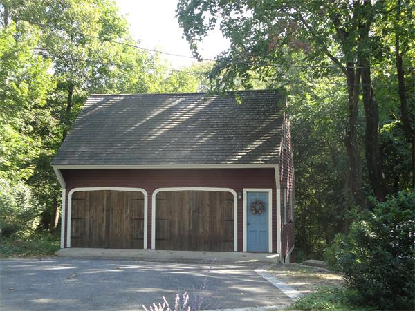524 Concord Road Sudbury, MA 01776 - Photo 15 of 20 front view of a house with a tree