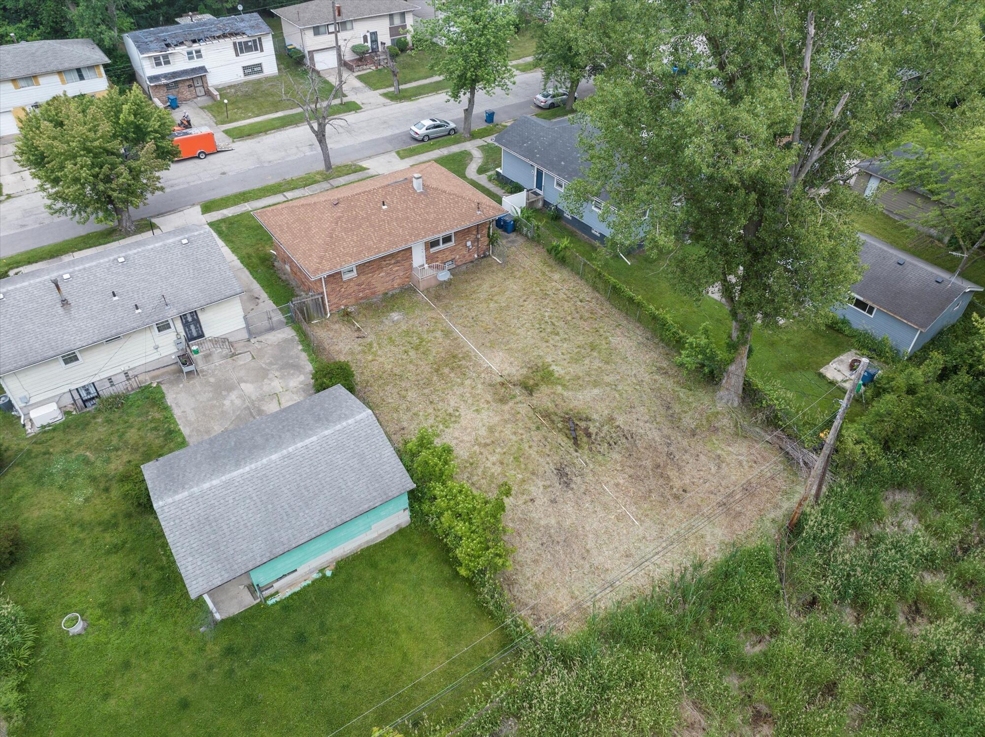 6715 East 3rd Avenue Gary, IN 46403 - Photo 3 of 25 an aerial view of a house with a yard