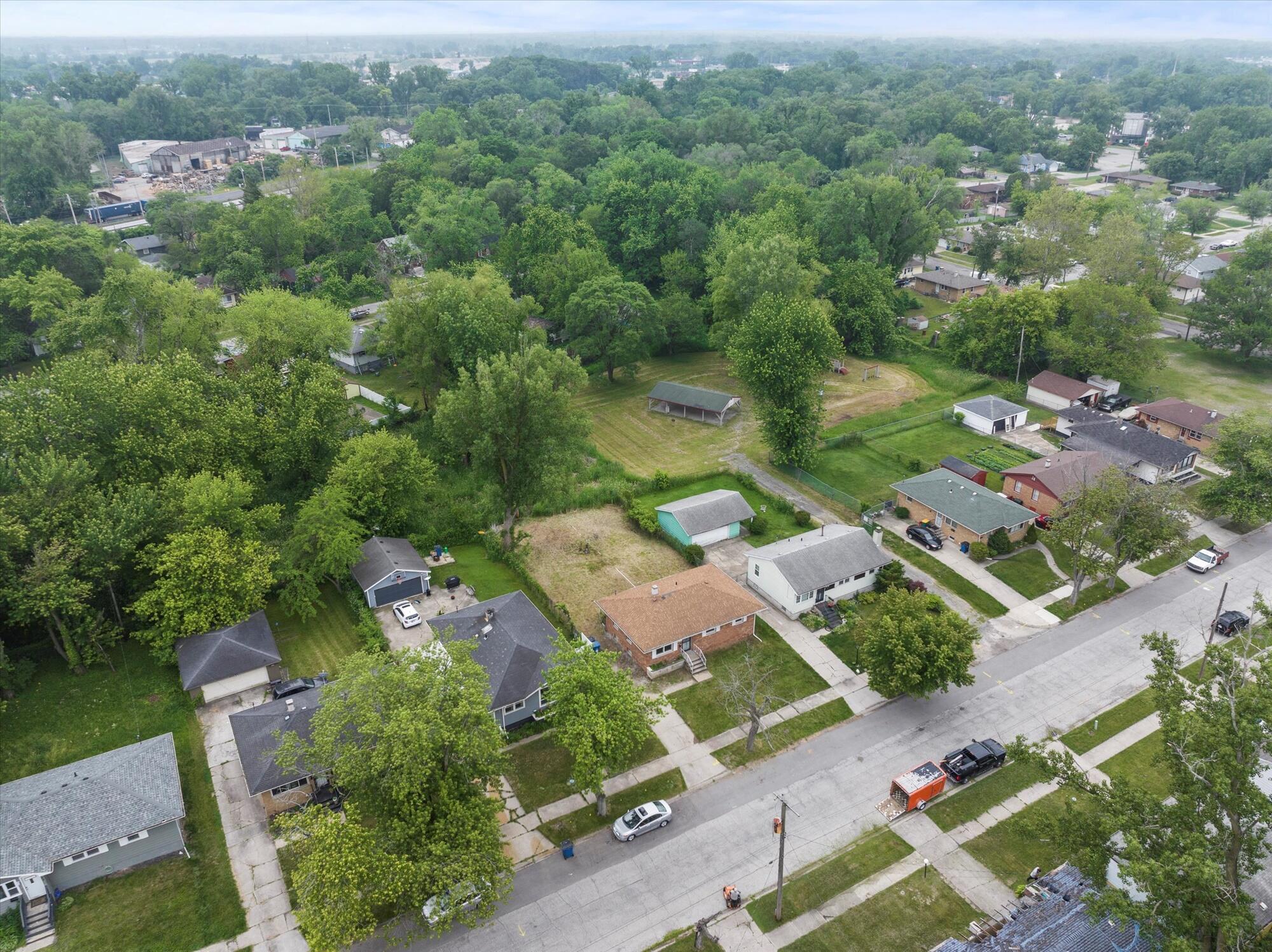 6715 East 3rd Avenue Gary, IN 46403 - Photo 6 of 25 an aerial view of a city with lots of residential buildings