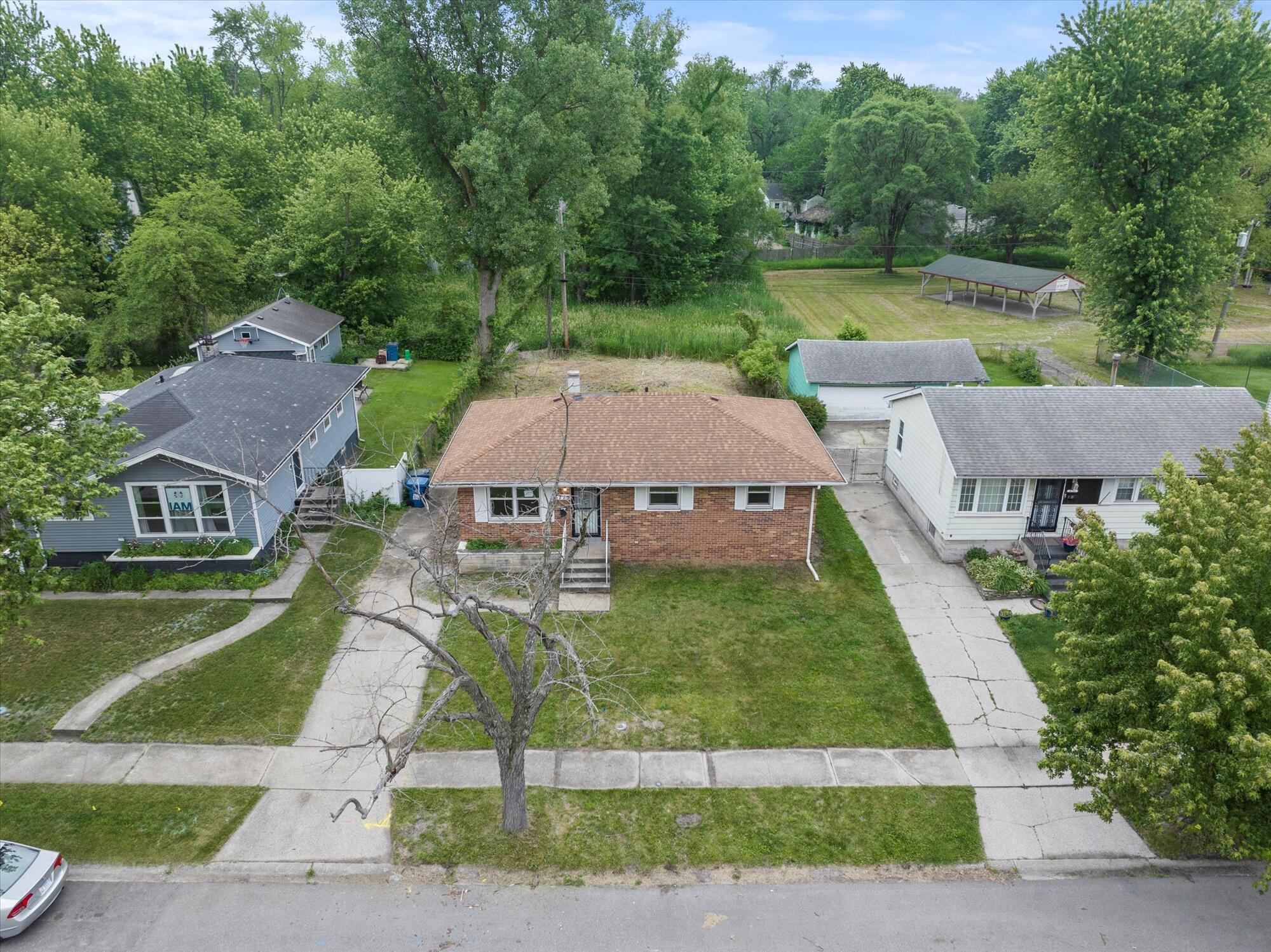 6715 East 3rd Avenue Gary, IN 46403 - Photo 7 of 25 an aerial view of a house with a yard