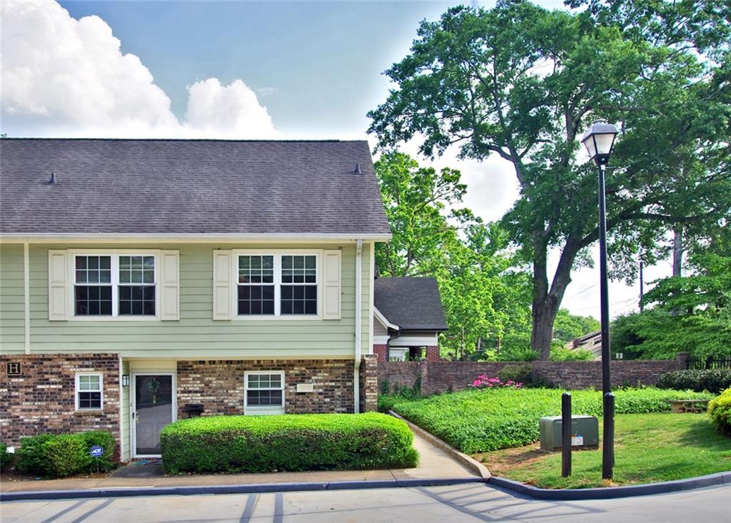 307 Adair Street Decatur, GA 30030 - Photo 1 of 1 a front view of house with yard and green space