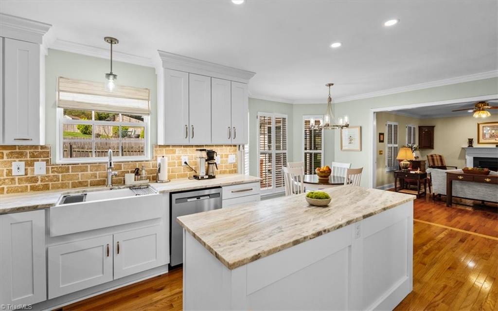 3303 Bardwell Road Greensboro, NC 27410 - Photo 18 of 50 . . . marble countertops, stone backsplash, farmhouse sink. . .