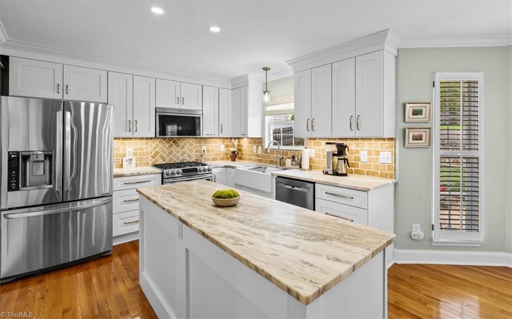 3303 Bardwell Road Greensboro, NC 27410 - Photo 19 of 50 . . . under cabinet-lighting and tons of storage space. The refrigerator stays.