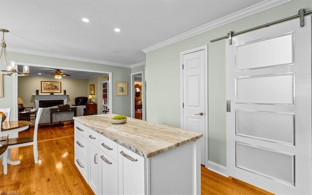 3303 Bardwell Road Greensboro, NC 27410 - Photo 20 of 50 The barn door to the right leads to the laundry room.