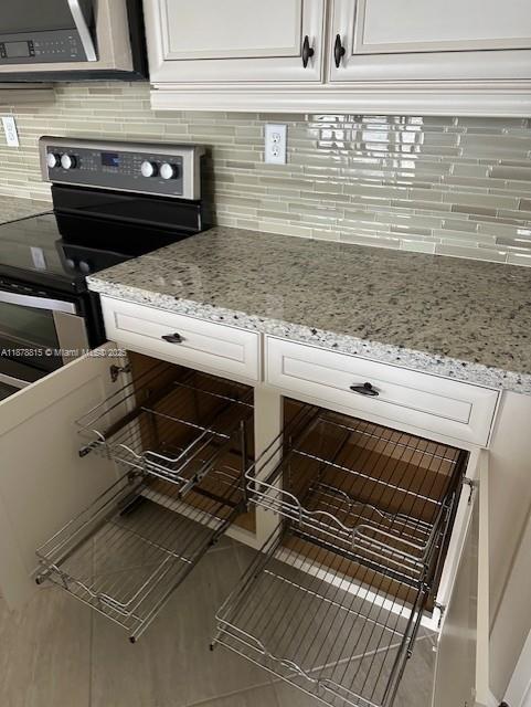 1415 Southwest 113th Avenue, Unit 1415 Pembroke Pines, FL 33025 - Photo 11 of 44 a view of washer and dryer