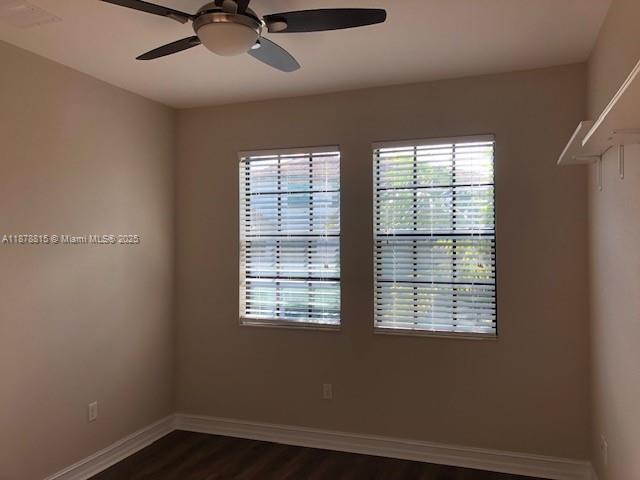 1415 Southwest 113th Avenue, Unit 1415 Pembroke Pines, FL 33025 - Photo 24 of 44 a view of a room with a window and ceiling fan