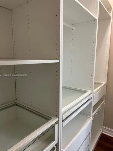 a bathroom with a shower and bathtub