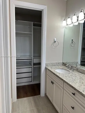 a white bath tub and a shower
