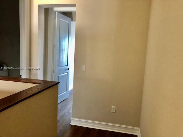 1415 Southwest 113th Avenue, Unit 1415 Pembroke Pines, FL 33025 - Photo 33 of 44 a bathroom with a granite countertop sink and a mirror