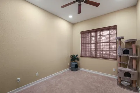 an aerial view of a house with a garden