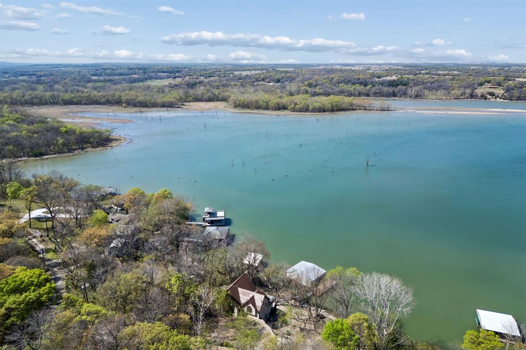 41 White Oak Road Gainesville, TX 76240 - Photo 40 of 40 a view of a lake with a mountain