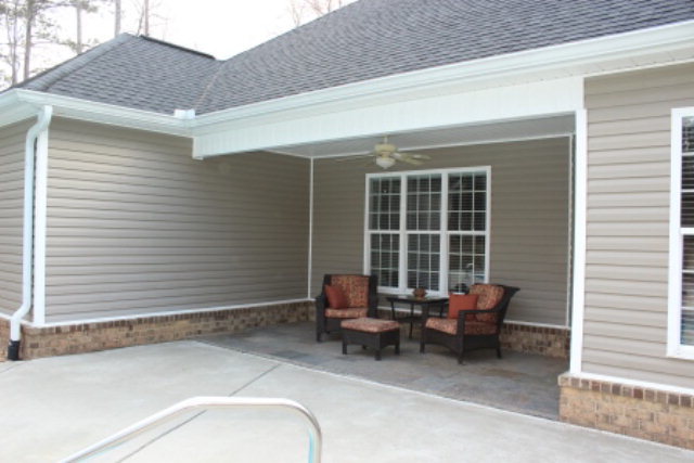 635 Klopfer Road Juliette, GA 31046 - Photo 11 of 18 a backyard of a house with chairs and a table