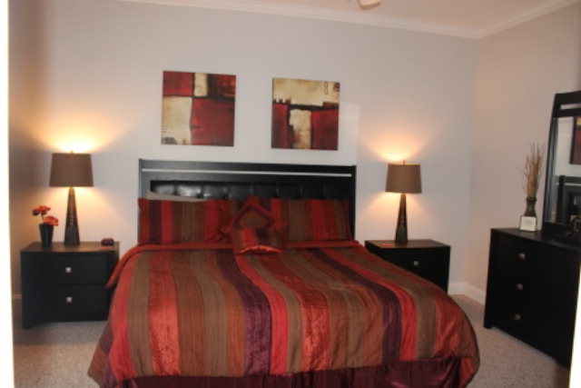 635 Klopfer Road Juliette, GA 31046 - Photo 14 of 18 a bedroom with a bed and a night stand