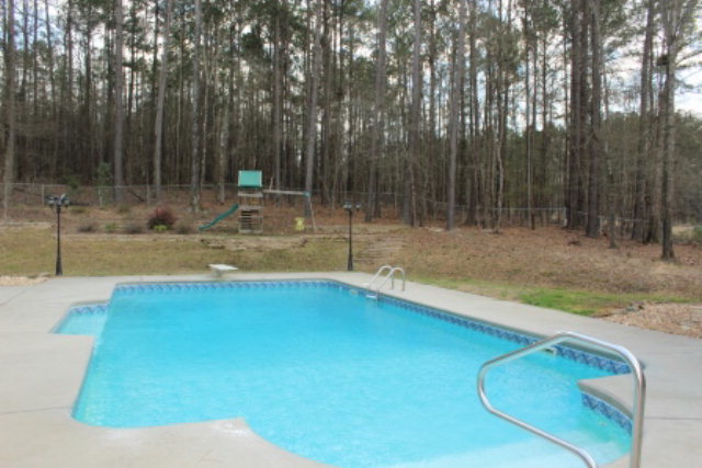 635 Klopfer Road Juliette, GA 31046 - Photo 15 of 18 a view of a backyard