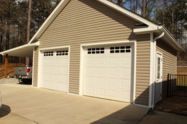 635 Klopfer Road Juliette, GA 31046 - Photo 16 of 18 a view of a house with a garage