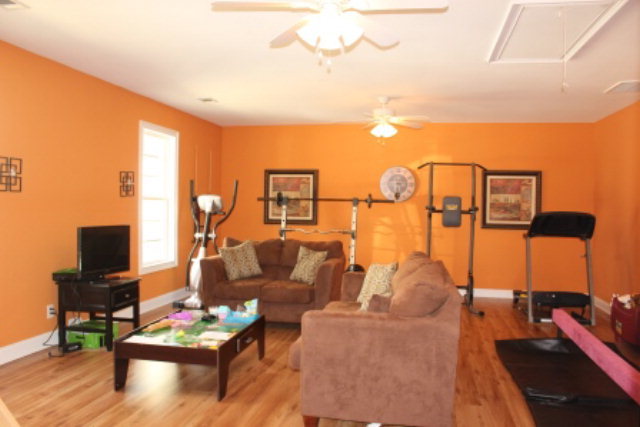 635 Klopfer Road Juliette, GA 31046 - Photo 4 of 18 a living room with furniture and a flat screen tv