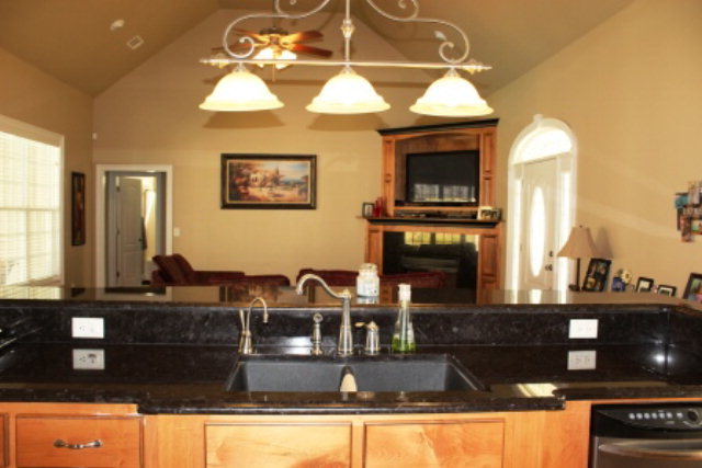 635 Klopfer Road Juliette, GA 31046 - Photo 8 of 18 a kitchen with a stove and a microwave