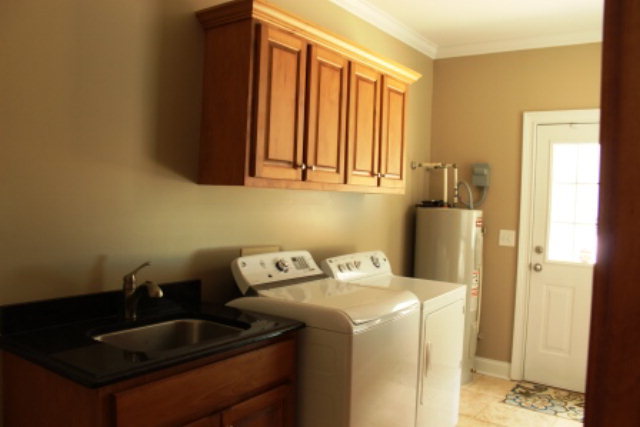 635 Klopfer Road Juliette, GA 31046 - Photo 9 of 18 a utility room with dryer and washer