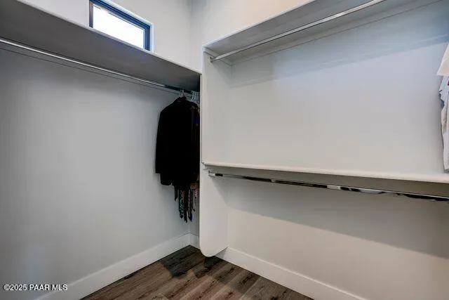 a bed room with furniture and a window