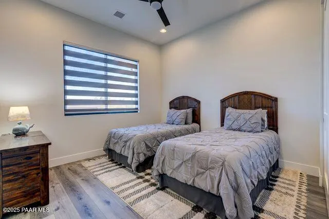 a bathroom with a toilet sink and shower