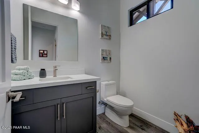a utility room with cabinets and a washer dryer