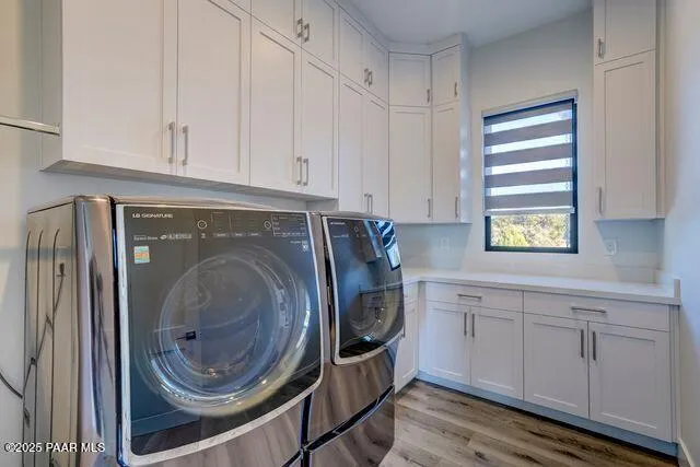 a bathroom with a tub a sink and a shower
