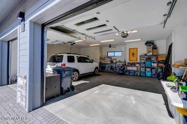 a building outdoor space with patio furniture and wooden floor