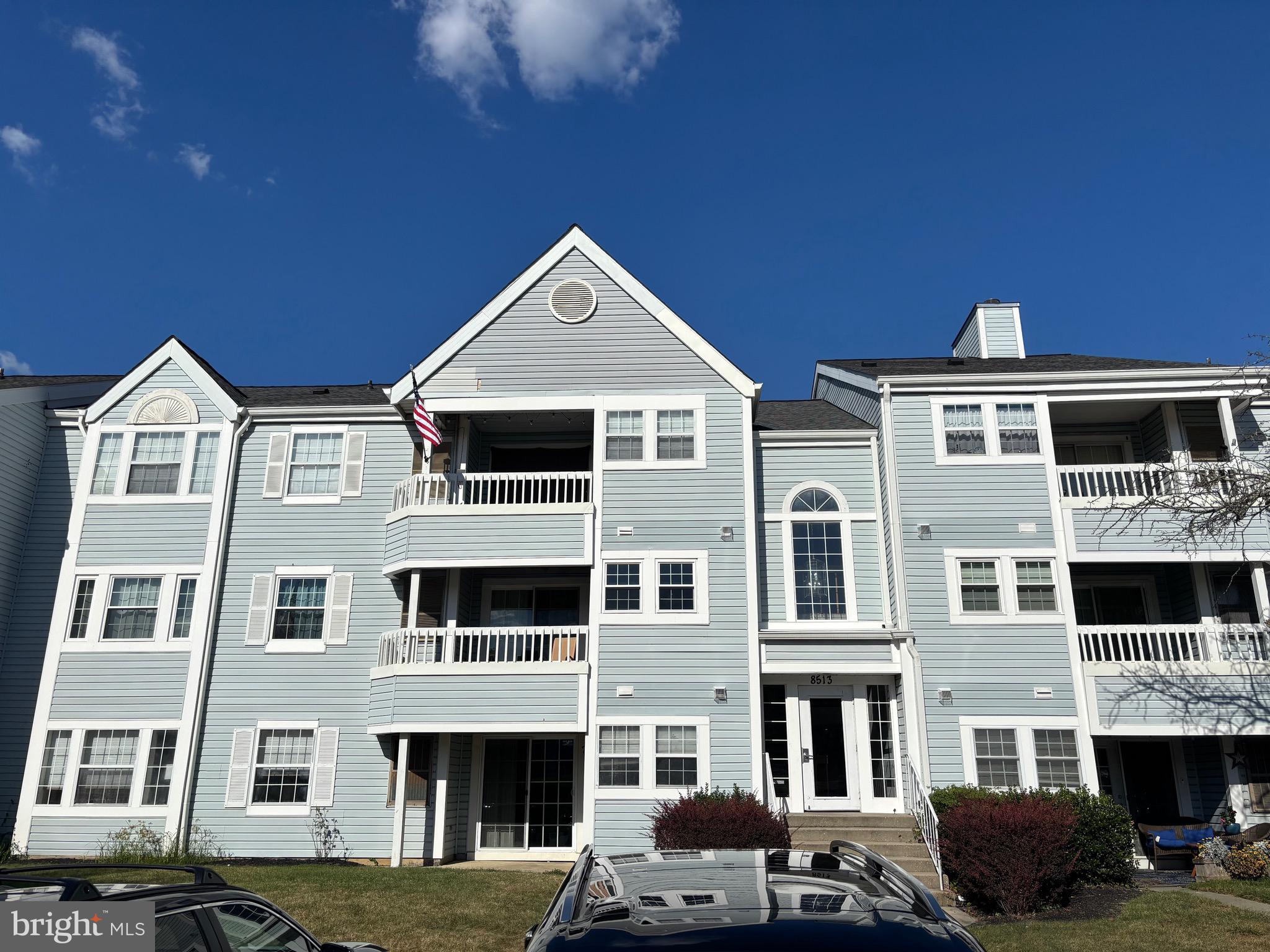8513 Falls Run Road, Unit A Ellicott City, MD 21043 - Photo 1 of 39 a front view of residential houses with street